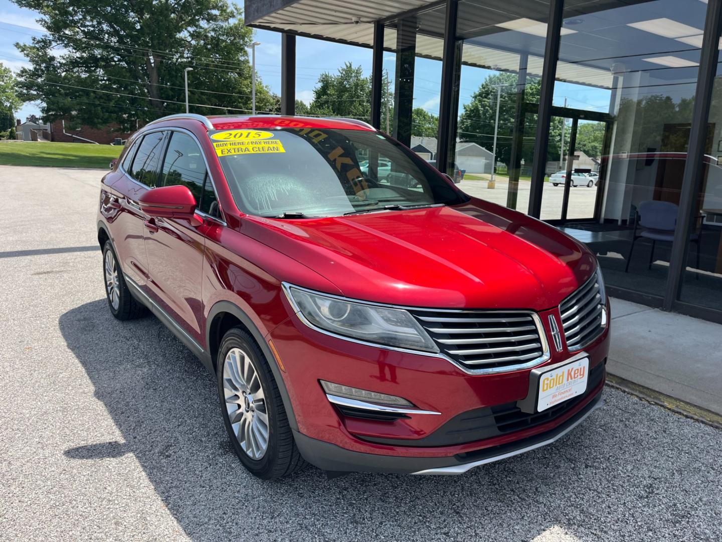 2015 Ruby Red Met Tinted CC Lincoln MKC AWD (5LMCJ2A92FU) with an 2.0L L4 DOHC 16V engine, 6-Speed Automatic transmission, located at 1633 W Kimberly, Davenport, IA, 52806, (563) 323-5341, 41.559456, -90.598732 - Photo#2